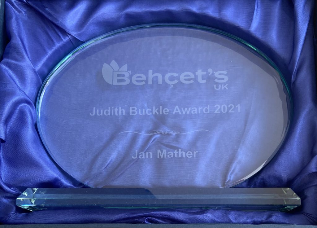 Close-up photo of the 2021 glass award which was given to Jan Mather