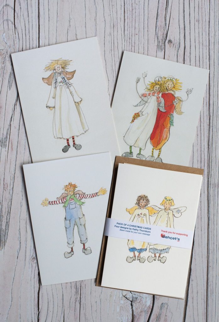 Photo of four illustrated Christmas Angel card designs 