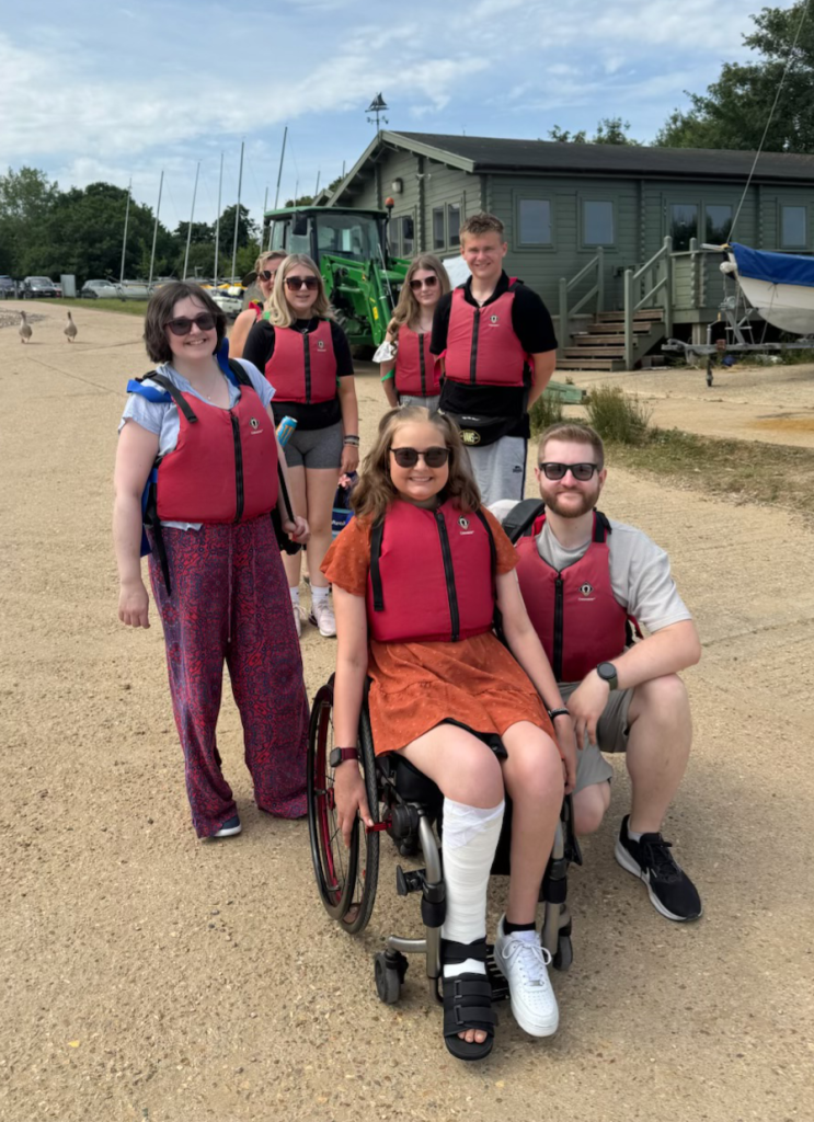 Some of our friends and family day guests donning their sunglasses and buoyancy aids before they board the sailing boat.